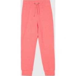 Kids Only - Spodnie dziecięce 134-164 cm. Pomarańczowe spodnie dziewczęce marki Kids Only, bez wzorów, z bawełny, casualowe. Za 69,90 zł.