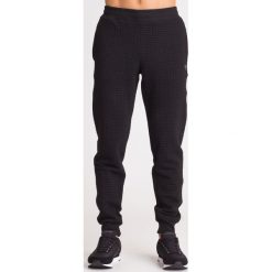 SPODNIE DRESOWE REGULAR FIT EA7 EMPORIO ARMANI. Czarne spodnie męskie EA7 Emporio Armani, na imprezę, s, z aplikacjami, z dzianiny, klasyczne. Za 394,50 zł.
