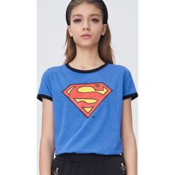 Koszulka Superman - Niebieski. Niebieskie koszulki damskie Sinsay, s, z motywem z bajki, bez kołnierzyka. Za 29,99 zł.