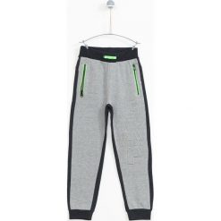 Lemon Explore - Spodnie dziecięce 122-164 cm. Szare spodnie chłopięce marki LEMON explore, bez wzorów, z bawełny, sportowe. W wyprzedaży za 49,90 zł.