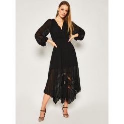 Sukienka codzienna The Kooples FROB20035K. Czarne sukienki damskie The Kooples, na co dzień, bez wzorów, z jedwabiu, bez kołnierzyka, bez rękawów, proste. Za 1269,00 zł.