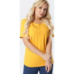 Żółty T-shirt Aetheriel. Żółte bluzki damskie Born2be, xl, bez wzorów, z dzianiny, bez kołnierzyka, bez rękawów. Za 29,99 zł.