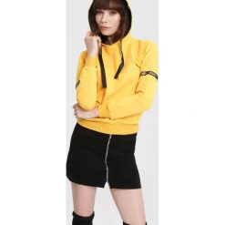 Żółta Bluza Unnerve. Żółte bluzy sportowe damskie marki other, m. Za 44,99 zł.