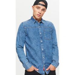 Denimowa koszula - Niebieski. Niebieskie koszule męskie na spinki Cropp, l. W wyprzedaży za 39,99 zł.