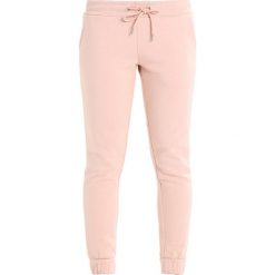Spodnie dresowe damskie: Urban Classics Spodnie treningowe lightrose