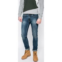 Dickies - Jeansy. Niebieskie jeansy męskie z dziurami marki House. W wyprzedaży za 239,90 zł.