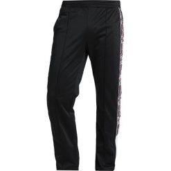 Spodnie dresowe męskie: Champion Reverse Weave SPECIAL SEMI DULL Spodnie treningowe black