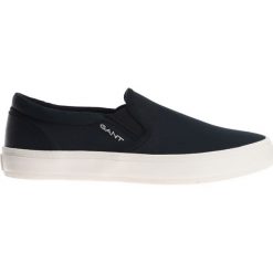 Gant Zoee Slip On Buty Czarny. Czarne trampki i tenisówki damskie GANT, bez wzorów, z materiału, bez zapięcia. Za 309,95 zł.