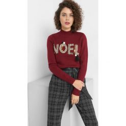 Sweter z błyszczącym napisem. Różowe bez kategorii Orsay, m, z napisami, z dzianiny, wizytowe, z golfem. W wyprzedaży za 35,00 zł.