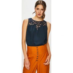 Jacqueline de Yong - Top Fabio. Niebieskie bluzki damskie marki Jacqueline de Yong, z elastanu, z okrągłym kołnierzem. W wyprzedaży za 39,90 zł.