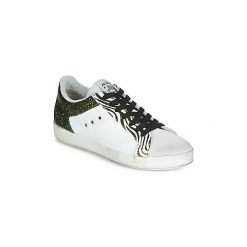 Buty Meline ZEBRINO. Białe trampki i tenisówki damskie Meline, bez wzorów, bez zapięcia. Za 479,00 zł.