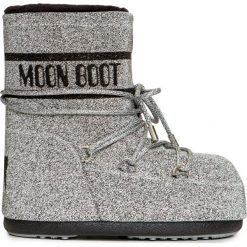 Śniegowce MOON BOOT CLASSIC LOW 50 SWAROVSKI. Szare śniegowce damskie Moon Boot, na zimę, z kauczuku, klasyczne, bez zapięcia. Za 11000,00 zł.