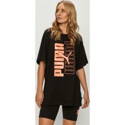 Puma - T-shirt. Czarne bluzki damskie Puma, s, z nadrukiem, z elastanu, casualowe, z okrągłym kołnierzem. Za 129,90 zł.