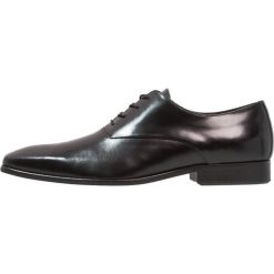 Zign Eleganckie buty black. Czarne buty wizytowe męskie marki Zign, bez wzorów, ze skóry, eleganckie, na sznurówki. Za 379,00 zł.