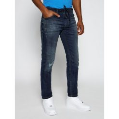 Jeansy Slim Fit Diesel Thommer 00S8MK 069HI. Niebieskie jeansy męskie Diesel, s, bez wzorów. W wyprzedaży za 599,00 zł.