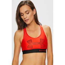 Under Armour - Biustonosz Armour Mid Graphic. Czerwone biustonosze sportowe damskie marki Under Armour, s, z nadrukiem, z elastanu. W wyprzedaży za 99,90 zł.