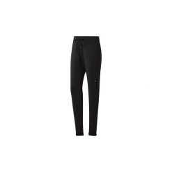 Spodnie treningowe Reebok Sport Spodnie dresowe Training Supply Slim. Czarne bryczesy damskie Reebok Sport, l, z dresówki. Za 249,00 zł.