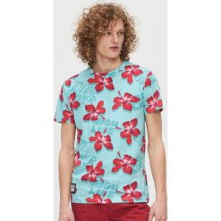 Koszulka w hibiskusy - Turkusowy. Niebieskie koszulki męskie Cropp, s, bez wzorów, bez kołnierzyka, bez rękawów. W wyprzedaży za 25,99 zł.