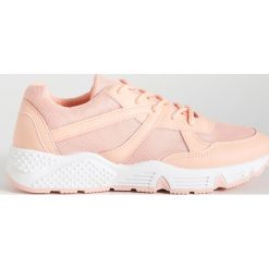 Sportowe buty - Pomarańczowy. Pomarańczowe buty sportowe damskie Sinsay, bez wzorów, sportowe. Za 59,99 zł.