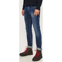 Diesel - Jeansy Thommer. Niebieskie jeansy męskie Diesel, bez wzorów. W wyprzedaży za 629,90 zł.