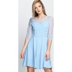 Niebieska Sukienka Love Dance. Niebieskie sukienki damskie Born2be, s, bez wzorów, z poliesteru, wizytowe, bez kołnierzyka, bez rękawów. Za 59,99 zł.