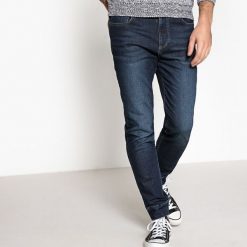 Dżinsy z dzianiny. Niebieskie jeansy męskie z dziurami marki La Redoute Collections. Za 146,96 zł.