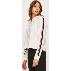 Reebok - Bluza. Białe bluzy damskie Reebok, s, z aplikacjami, z bawełny, z krótkim rękawem, krótkie, z kapturem. Za 169,90 zł.