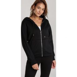 Czarna Bluza Laririope. Czarne bluzy damskie Renee, xl, bez wzorów, bez rękawów, bez kaptura. Za 89,99 zł.