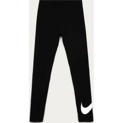 Nike Kids - Legginsy dziecięce 122-166 cm. Czarne spodnie dziewczęce Nike Kids, z nadrukiem, z elastanu. Za 79,90 zł.