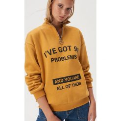 Bluza z rozpinanym półgolfem - Żółty. Żółte bluzy damskie Sinsay, s, bez wzorów, bez rękawów, bez kaptura. Za 59,99 zł.