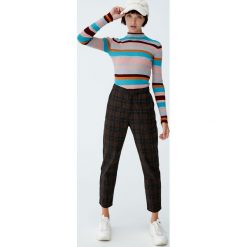 Spodnie tailoring w kratkę. Szare spodnie damskie Pull&Bear. Za 49,90 zł.