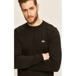 Lacoste - Bluza. Niebieskie bluzy męskie Lacoste, s, z aplikacjami, z elastanu, z okrągłym kołnierzem, bez rękawów, bez kaptura. W wyprzedaży za 379,90 zł.