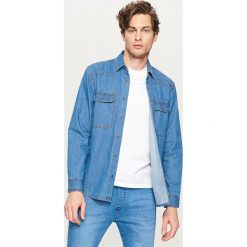 Jeansowa koszula regular fit - Niebieski. Niebieskie koszule męskie Reserved, s, bez wzorów, z jeansu, bez kołnierzyka, bez rękawów. Za 119,99 zł.