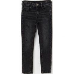 Jeansy slim fit z efektem sprania - Czarny. Czarne jeansy męskie Reserved, bez wzorów. Za 89,99 zł.