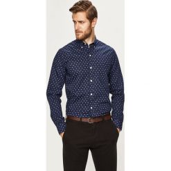 Izod - Koszula. Niebieskie koszule męskie IZOD, s, bez wzorów, z bawełny, casualowe, button down, z długim rękawem. W wyprzedaży za 139,90 zł.