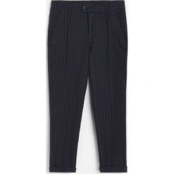 Eleganckie spodnie w paski -. Spodnie męskie Reserved, w paski, eleganckie. Za 79,99 zł.