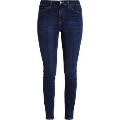 Topshop JAMIE NEW Jeans Skinny Fit indigo. Niebieskie rurki damskie marki Topshop. Za 229,00 zł.