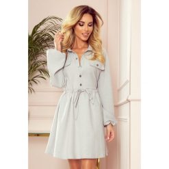 Rozkloszowana sukienka szmizjerka z wiązaniem w pasie. Sukienki damskie Made in Poland, s, bez wzorów, z elastanu, bez kołnierzyka, bez rękawów, rozkloszowane. Za 229,00 zł.