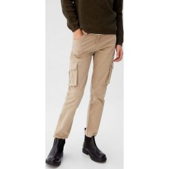 Mango Kids - Spodnie dziecięce Sebas 110-164 cm. Spodnie chłopięce Mango Kids, bez wzorów, z elastanu. Za 99,90 zł.