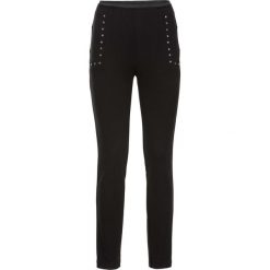 Tregginsy z ćwiekami "bodyshaping" bonprix czarny. Czarne spodnie damskie bonprix, bez wzorów. Za 49,99 zł.