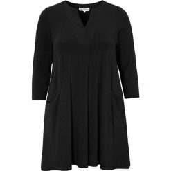 Zhenzi Dżersejowa tunika z kieszeniami Anja Czarny female czarny 54/56 (XL). Czarne tuniki damskie Zhenzi, s, bez wzorów, z dżerseju, z okrągłym kołnierzem, bez rękawów. Za 229,00 zł.