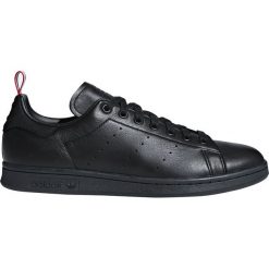 Adidas Originals Stan Smith Tenisówki Czarny. Czarne trampki męskie adidas Originals, bez wzorów, ze skóry, bez zapięcia. Za 533,95 zł.