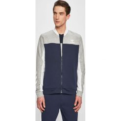 Hummel - Bluza. Niebieskie bluzy męskie Hummel, xl, bez wzorów, z elastanu, z kapturem, bez rękawów, bez kaptura. W wyprzedaży za 199,90 zł.