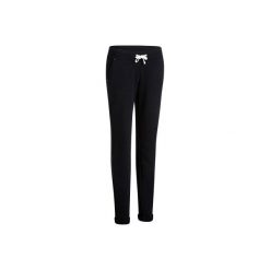 Spodnie slim Gym & Pilates 500 damskie. Czarne spodnie damskie marki DOMYOS, xs, z elastanu. Za 59,99 zł.