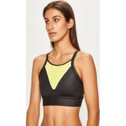 Puma - Biustonosz. Czarne biustonosze sportowe damskie Puma, xs, bez wzorów, z elastanu. W wyprzedaży za 159,90 zł.