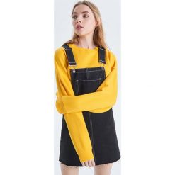 Sukienka ogrodniczka - Czarny. Czarne sukienki damskie Cropp, s, bez wzorów, bez kołnierzyka, bez rękawów. Za 119,99 zł.