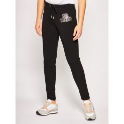Spodnie dresowe LOVE MOSCHINO W154301E 2139. Czarne spodnie damskie Love Moschino, z dresówki. W wyprzedaży za 499,00 zł.