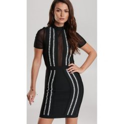 Czarna Sukienka Elinraya. Czarne sukienki damskie Renee, s, bez wzorów, wizytowe, bez kołnierzyka, bez rękawów. Za 189,99 zł.