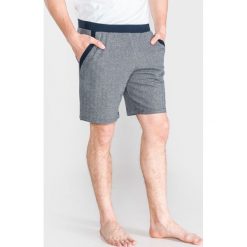 Emporio Armani Spodnie do spania Niebieski. Niebieskie spodnie męskie Emporio Armani, m, bez wzorów, z bawełny. Za 361,95 zł.