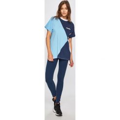 Ellesse - Legginsy. Niebieskie spodnie damskie marki Ellesse, bez wzorów, z elastanu. Za 129,90 zł.